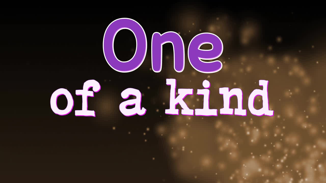 One of kind text animation over glowing particles on dark background