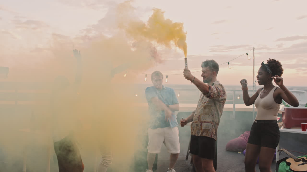 Group of Friends Partying on Rooftop Terrace