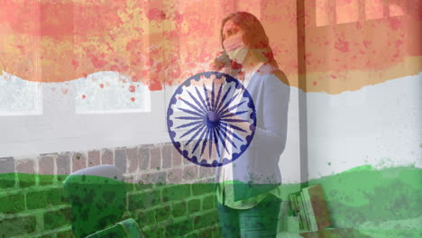 composición de una mujer con una máscara sobre la bandera de la india