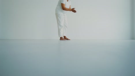 woman performing a dance or yoga pose