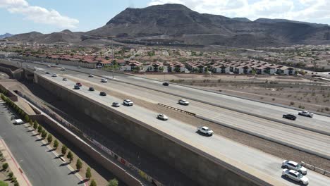 Aerial-View,-Cars-Driving-on-Highway,-Exiting-Ramp,-Henderson-Nevada