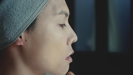 person applying makeup