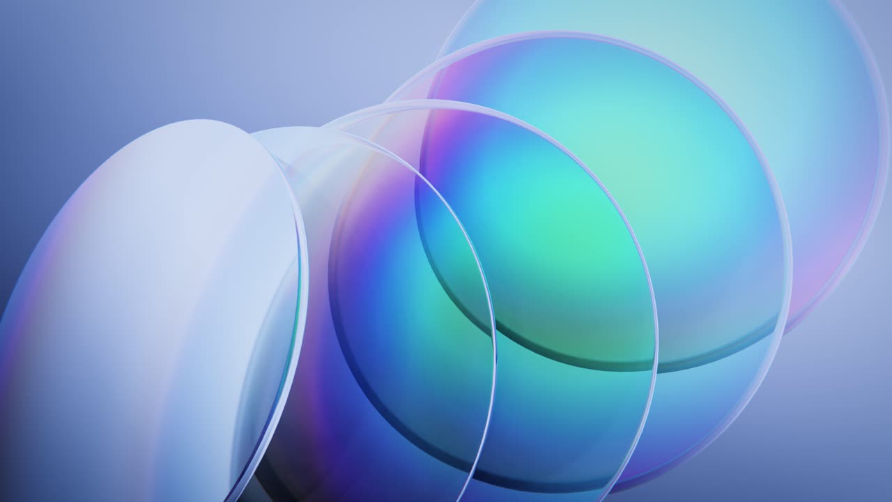 Rotating Transparent Discs with Iridescent Light Reflections