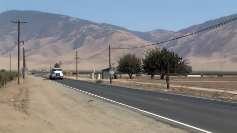 truck on country road in california, usa