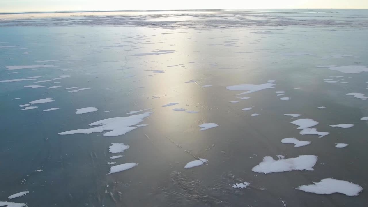 Frozen sea covered with a thick layer of ice.