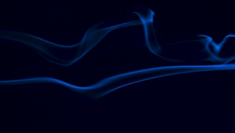 fog or smoke on black background backlit with blue light. free copy space. close up. slow motion