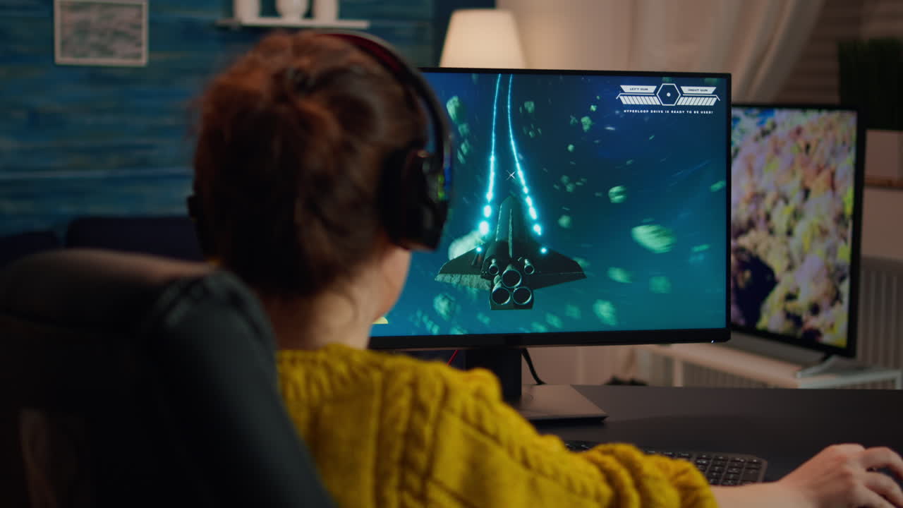 Pro gamer playing in the first person shooter on personal computer