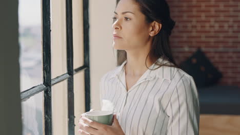 Thinking,-woman-and-smartphone-at-window