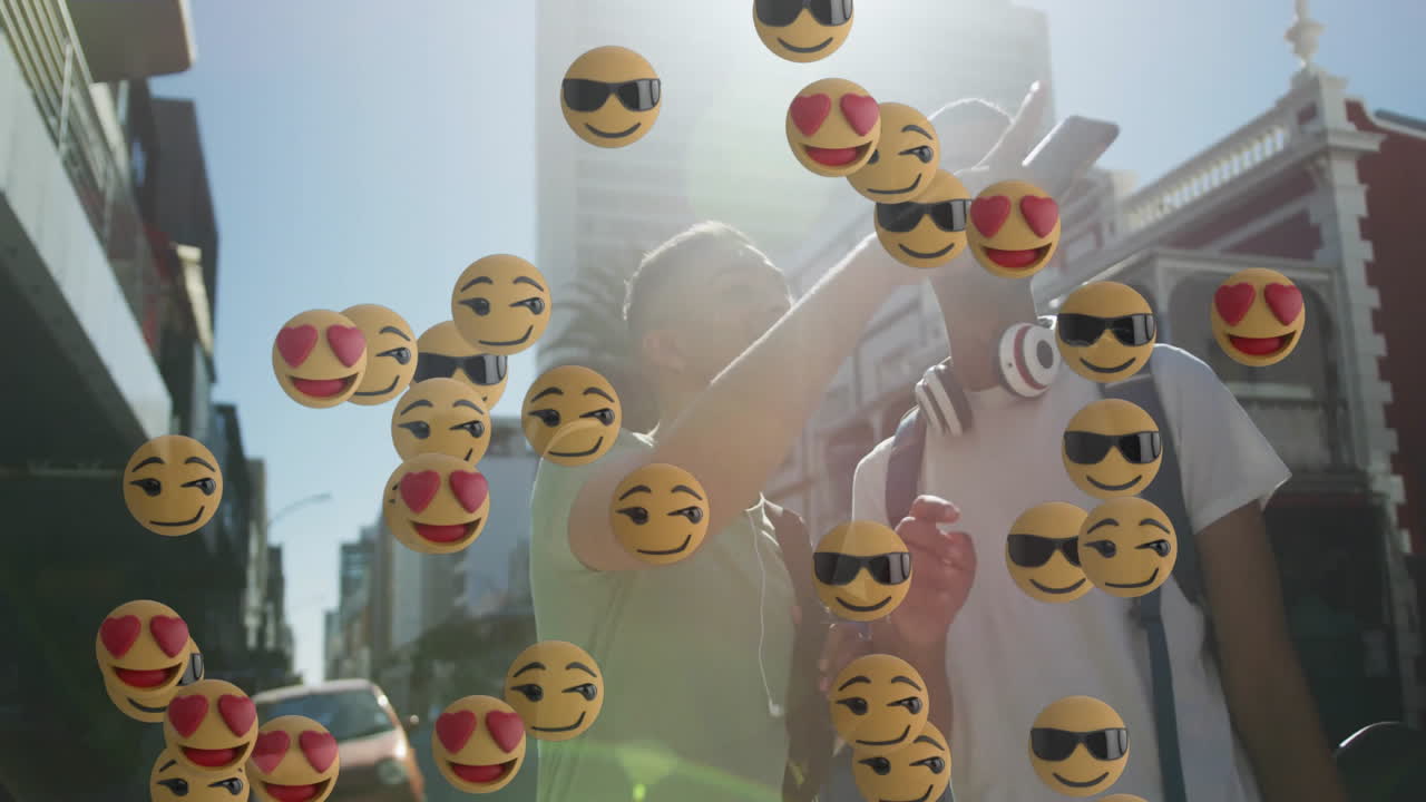 Two friends snapping phone selfie with floating heart-eyes  and  sunglasses emojis for marketing