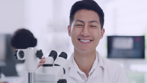 a male scientist in a research lab using