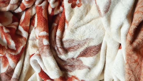 textured brown and cream blanket