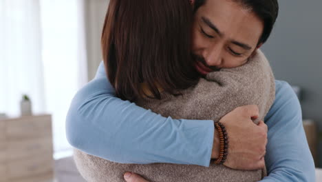 Love,-home-and-couple-hug-together-in-romance