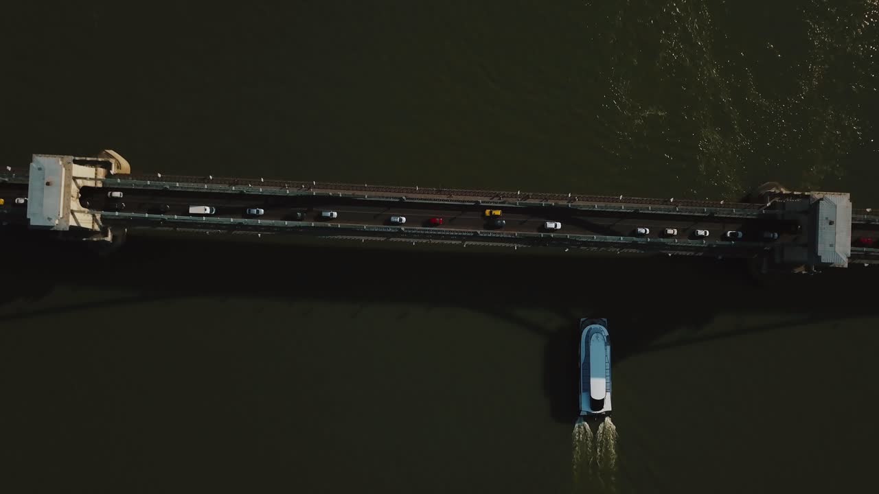 Aerial View of Bridge and Boat on River