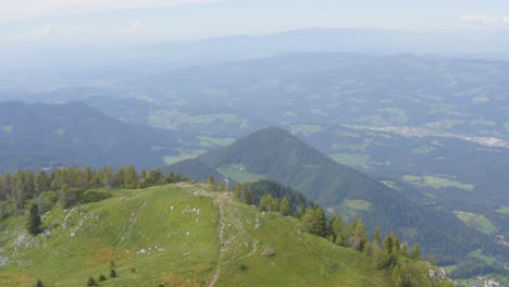 Breathtaking-altitude-of-St-Ursula-with-church-cross-Slovenia-Europe