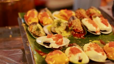 delicious grilled seafood platter at street food market