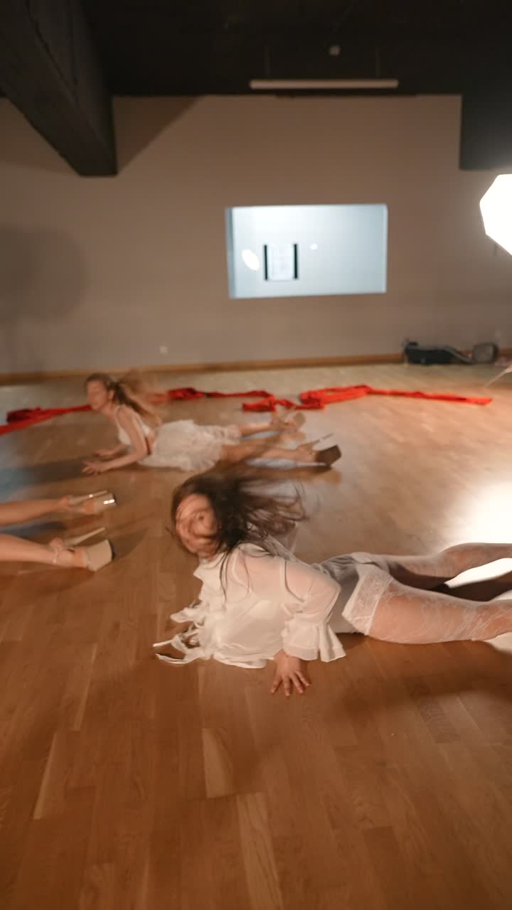 Female Pole Dancers in a Studio