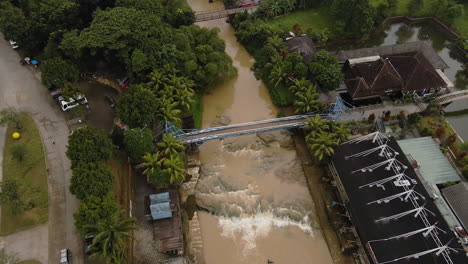 pedestrian bridge across the river in jakarta, indonesia