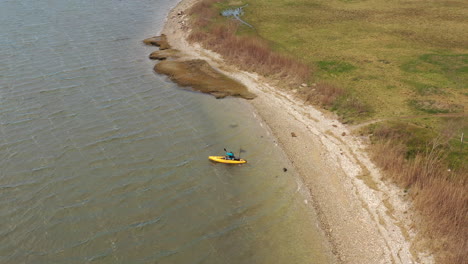 An-aerial-shot-over-a-salt-marsh-on-a-sunny-day