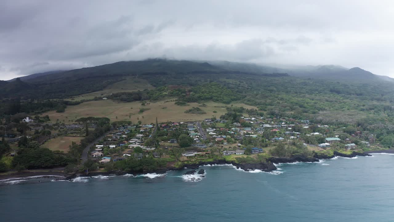 Wide panning aerial shot of Hana Town along Hana Bay on the slopes of Haleakala in Maui, Hawai'i