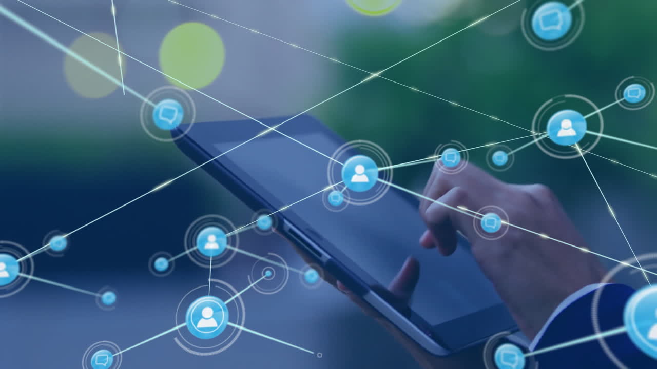 Using tablet, person interacting with digital icons and network animation
