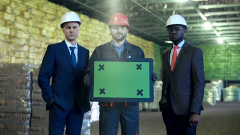 diverse people holding the chromakey pad