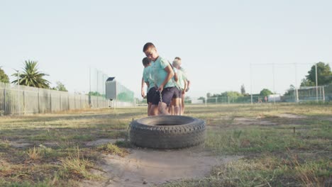 caucasian boys training at boot camp