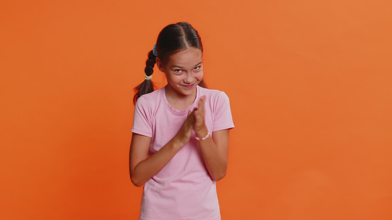 Sneaky cunning child girl kid thinking over devious villain idea cheats jokes pranks evil plan