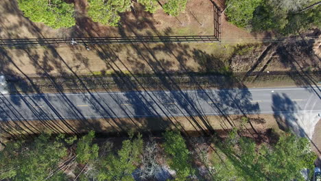 A-bird's-eye-view-aerial-shot-looking-down-on-an-empty-back-road