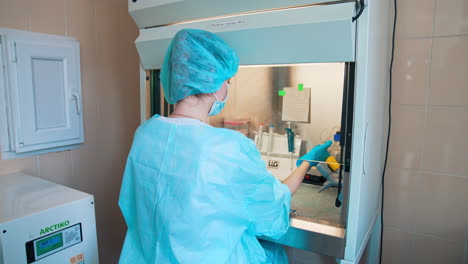 laboratory scientist holds samples. process of coronavirus testing examination by nurse medic in laboratory lab