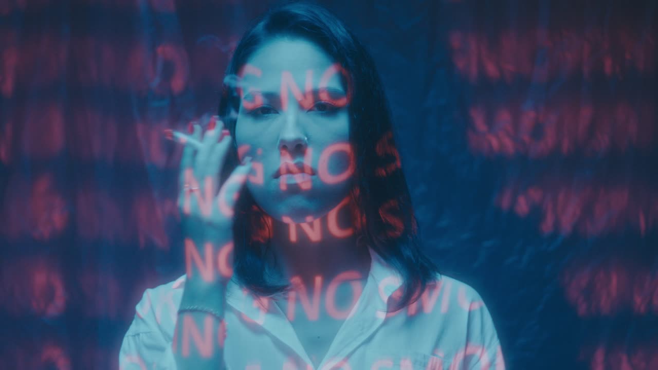 Woman Smoking with Projected Text Overlay