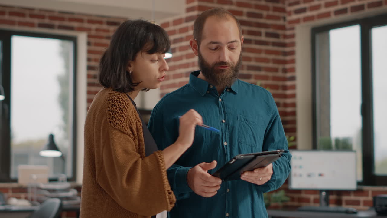 Two Business Professionals Collaborating in an Office
