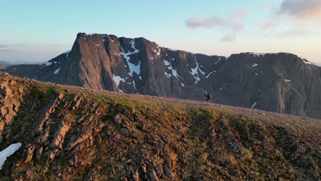 Hiker-on-Carn-Mor-Dearg-and-Ben-Nevis,-Highlands,-Scotland,-aerial