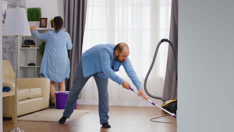 Man-mopping-the-floor