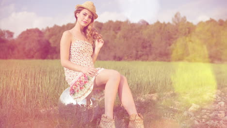 Beautiful-woman-sitting-on-a-disco-ball-in-nature