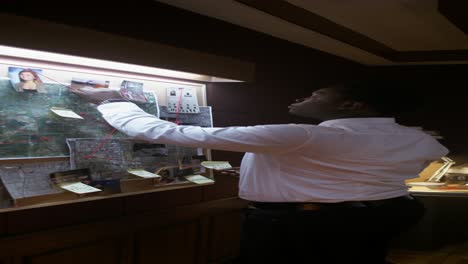 Detective reviewing evidence