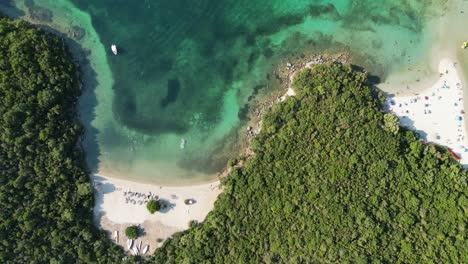 Syvota-white-sandy-beaches,-green-forest-and-turquoise-Ionian-sea-at-Epirus,-Greece---Aerial