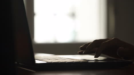 typing on a laptop