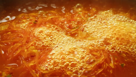 boiling noodles in soup