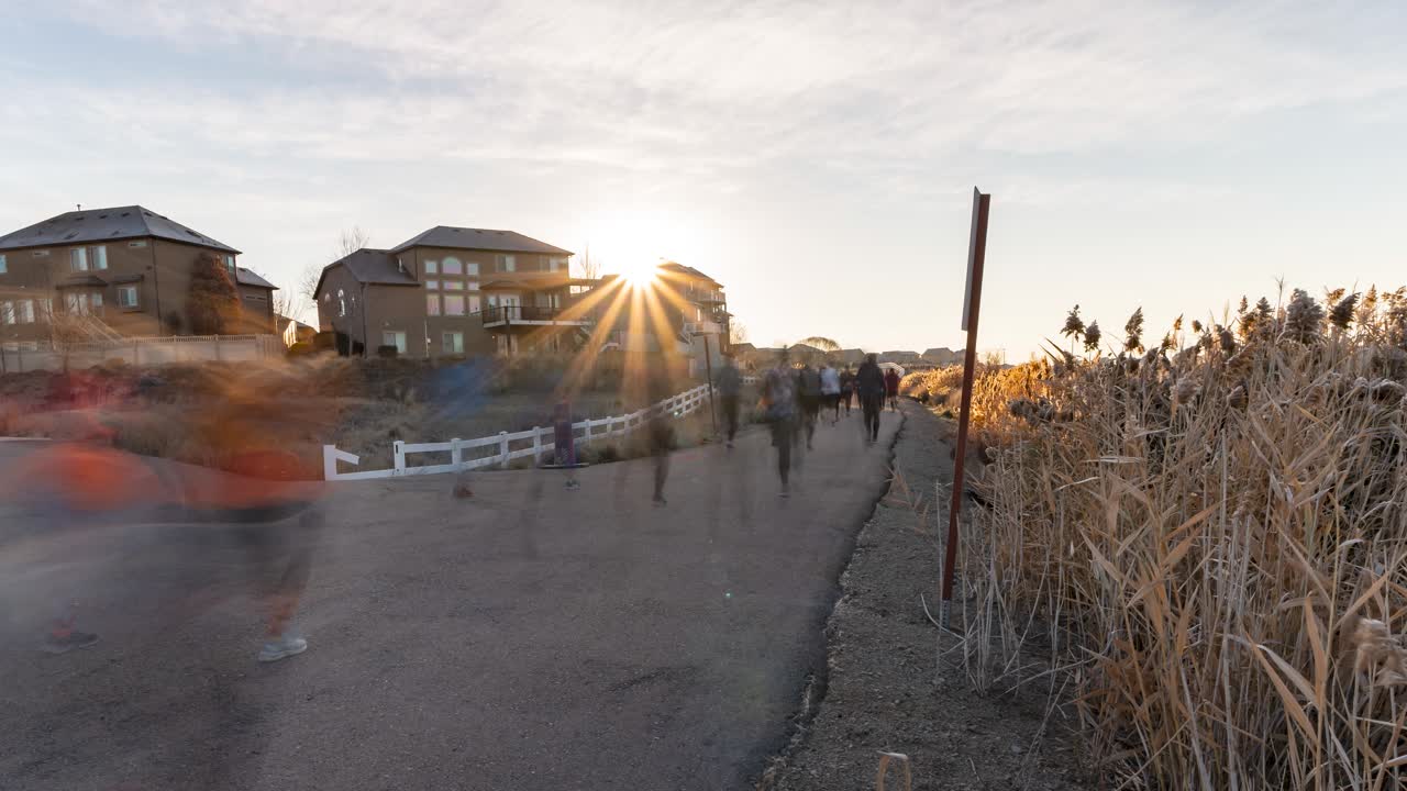 Participants take place in a Thanksgiving marathon Turkey run along a nature trail - time lapse