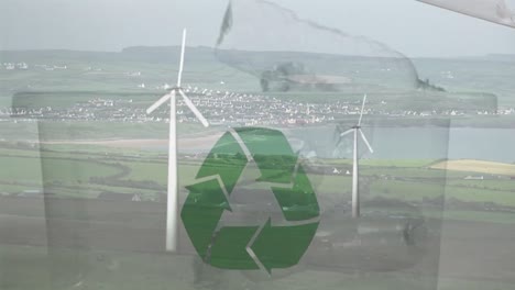 animation of green recycling sign over box with plastic bottles and wind turbine