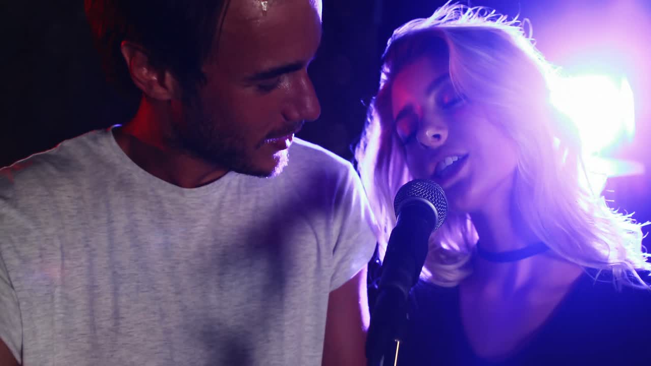 Couple singing a song together 4k