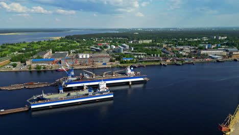 beautiful aerial view with drone of a modern port and its infrastructure for ships and containers