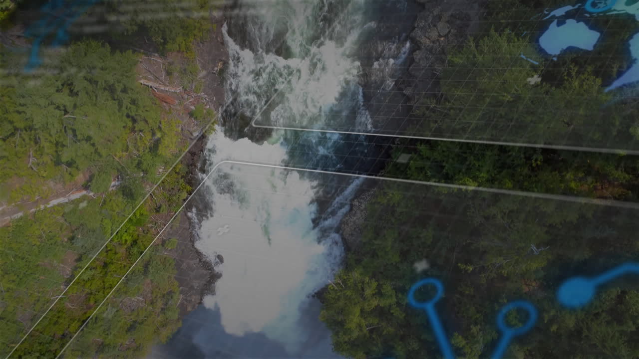 Waterfall flowing through lush forest with digital data overlay animation