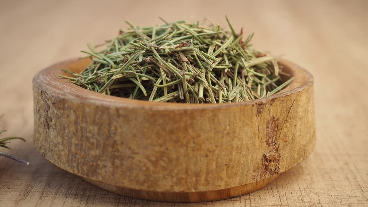 Dried Rosemary in Wooden Bowl