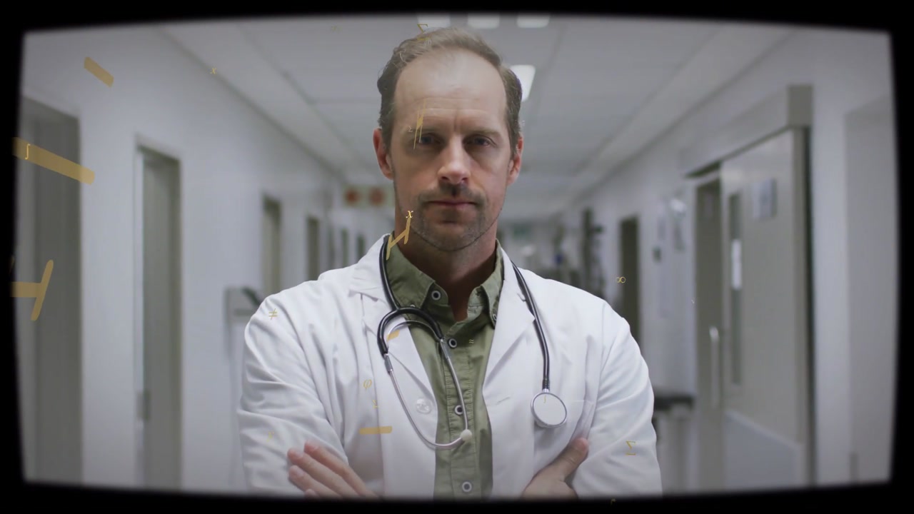 Doctor standing in hospital corridor, golden particles emerging then sweeping chest, showing care