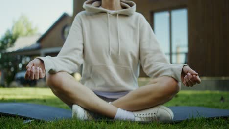 woman meditating outdoors