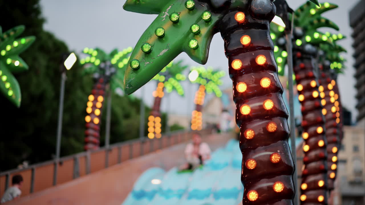 Blurry view of people at the attractions park in Nice, France
