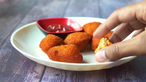 close up of chicken cheese meat ball on plate