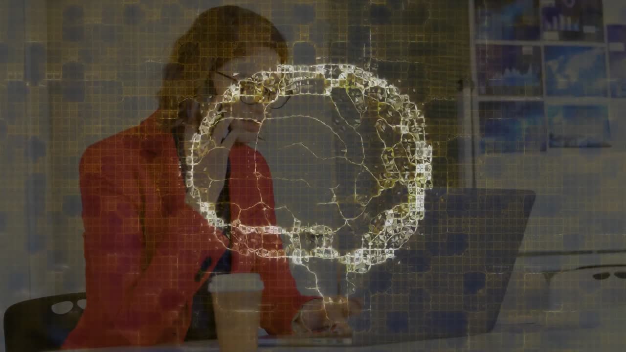 Animation of human brain and connections over business people in office