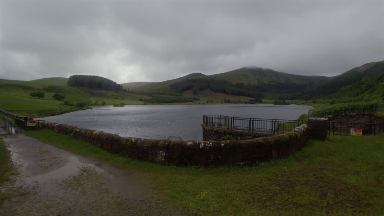 Serene Lake in the Scottish Highlands on a Cloudy Day